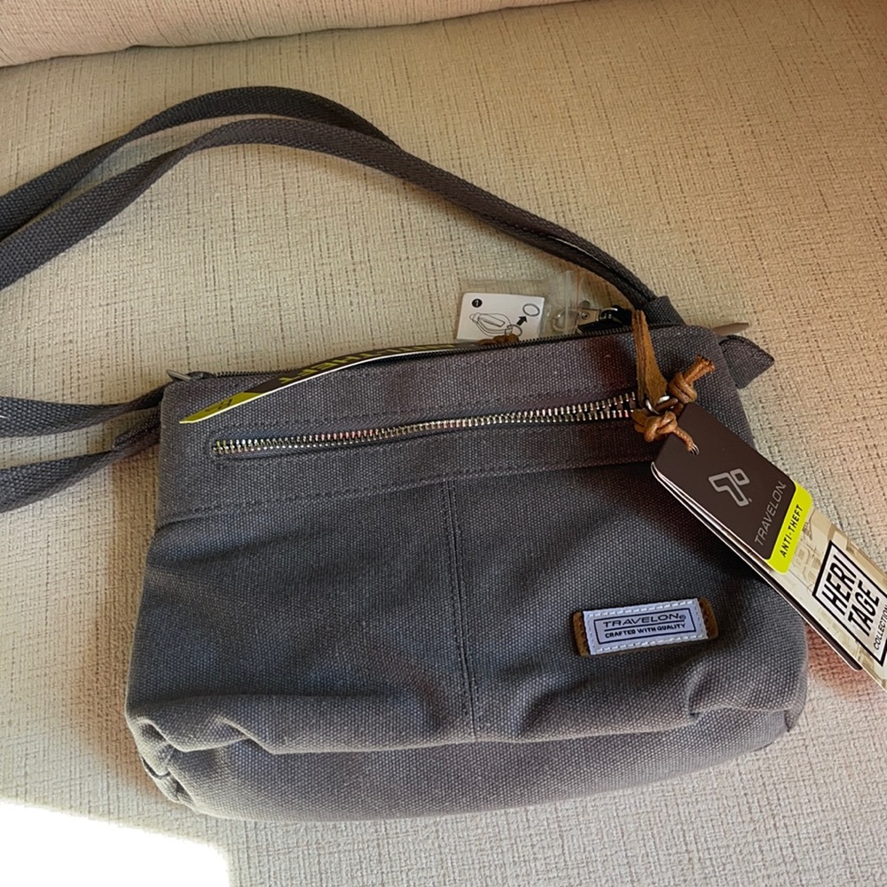 Travelon anti theft small crossbody travel bag.